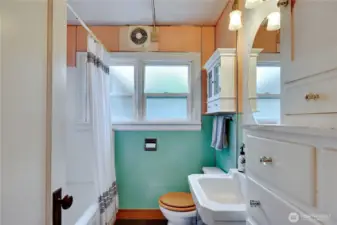 Full main bath with built in cabinets