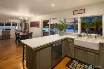 Kitchen to dining to living wall of windows!