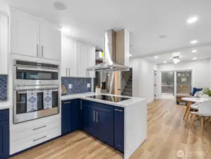 Two ovens, a stainless-steel hood, and Bosh cook top giving you everything you've hoped for in a kitchen