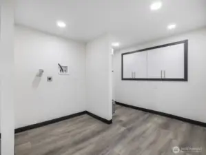 Lower level fully finished basement with washer-dryer hook-ups and built in storage