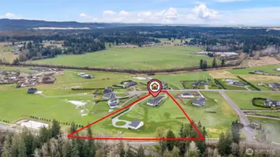 With 4.98 acres, the possibilities are endless!