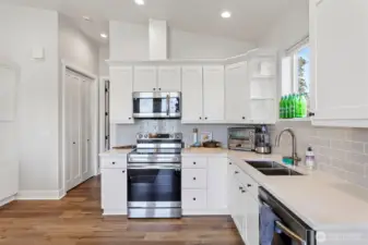 ADU: Full Kitchen, Refrigerator, Range, Microwave, Dishwasher.