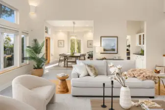 Open-concept living and dining areas with high ceilings and abundant natural light, offering seamless flow for everyday living and entertaining.