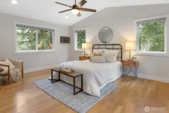 Primary bedroom is thoughtfully designed with his/hers outlets and reading lights.
