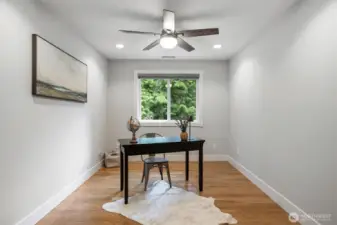 French door access to the additional office space/flex room on the top floor.