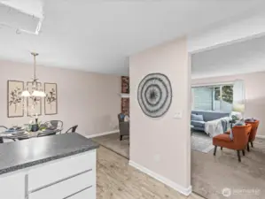 From the kitchen, views to the dining area and living room.