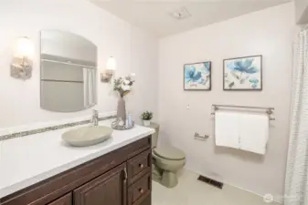 A full bath serves the secondary bedrooms, supporting everyday function on the Private Retreat Level.