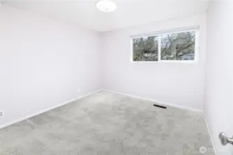 Bedroom 4 provides additional flexibility, reinforcing the home’s ability to accommodate a variety of living arrangements.