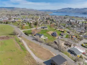 Aerial view 7 of homesite and building pad6located in the heart of Manson & overlooking Lake Chelan.