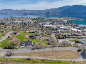 Aerial view of homesite and building pad6located in the heart of Manson & overlooking Lake Chelan.
