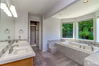 You'll love this open deluxe primary bath completing this primary suite.