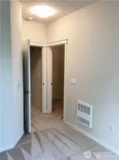 This is the view in the second bedroom back toward the door and walk-in closet.