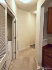 Just past the entryway is the laundry area on one side and the built-in office area on the other side!