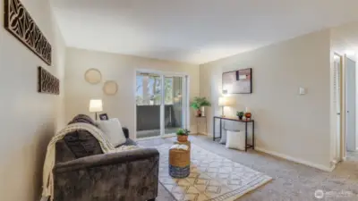 Enter to newer carpets throughout most of this spacious top floor condo.