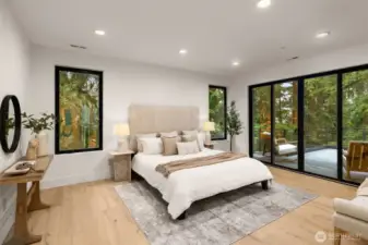 Primary luxury bedroom with private patio with mountain views