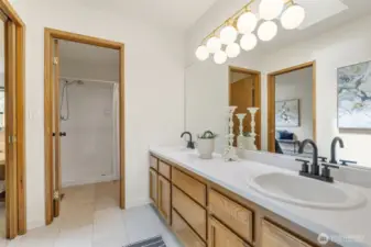 Looking towards shower and toilet. Double vanity!