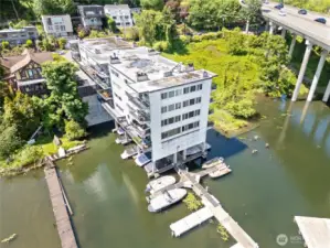 Conveniently located near I-5 and just minutes from the heart of the city, you’re close to everything. Prefer to travel by water? Your private community dock is ready for any aquatic adventure you can dream up. Plus, enjoy dedicated kayak and paddleboard storage and a spacious waterfront room perfect for relaxing or entertaining by the bay.