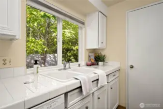 Great galley style kitchen with views of the greenbelt.  It doesn't feel like you are in the middle of the city.