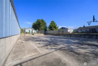 A full-sized fully fenced basketball court is part of the community.  Basketball, roller skating, pickle ball, roller blading are all options.