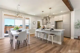 Staged  Dining area/kitchen - photo is for example purposes only and not the actual house.