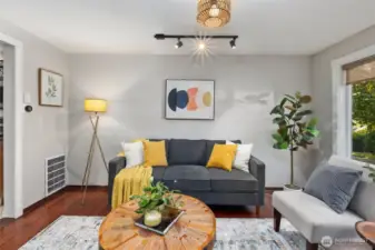 Your living room is bathed in natural light from the picture window overlooking the rose garden.
