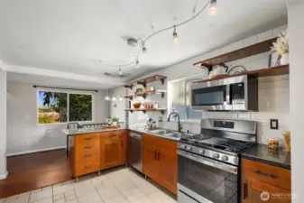 Enough space to cook as a group, or an easy layout for a single chef, this kitchen wraps all the way around providing plenty of bonus storage.