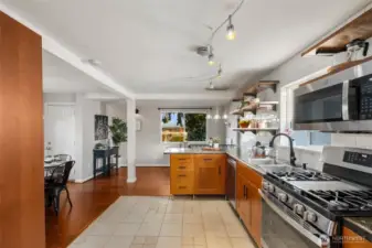 Enjoy the natural flow of the home welcoming you from the living room into the kitchen and dining areas. PLUS, the eastern view provides gorgeous morning light and views.