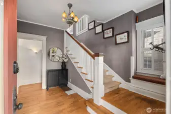 Welcome to the foyer entrance of this thoughtfully restored 1904 Capital Hill Craftsman Home