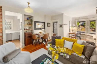 Queen of the West main floor cash flowing Airbnb living room and dining space. So much character!