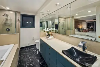 Top floor primary suite with jetted tub shower, fireplace and city views that will take your breath away!