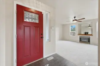 Entry opens into hallway and living room to left