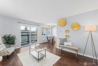 A great floor plan from the living room, to dining room to the outdoor covered balcony through the slider.