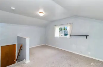 Upper bedroom #4 features a closets & access to attic space.