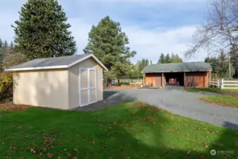 View of barn and storage shed.