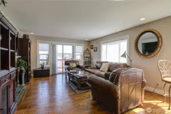 Living room has southern and eastern views, and a deck out front to enjoy the sunrises and moon rises.
