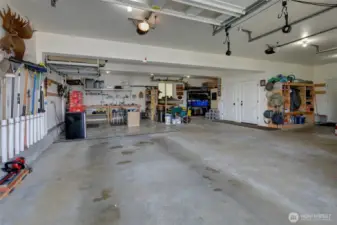 A quick peek inside this huge garage!  There is so much storage in here!!!!  And it's deep enough to fit 3+ vehicles, depending on their size!