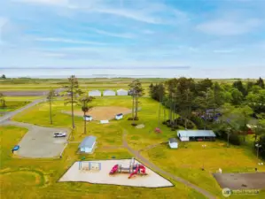 Located next tot he park with the lake and boat launch