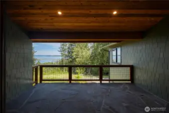 Covered front patio area, look at the flooring.