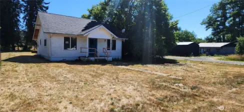 Front of home. Great corner lot just outside town.