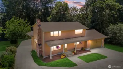 Slightly over 1 acre, tons of paved parking, 5 bedrooms, 3 full baths, 2 powder rooms and large double sink in Utility laundry area.  Garden & Brand New 8'X12' Greenhouse, wooded greenbelt in back.  6 garage parking spots. The oversized with way over 10 feet high ceiling enjoyed as a spectacular shop.  plus there is a nice 2 stall carport. Easily park at least 15 cars here, maybe more...