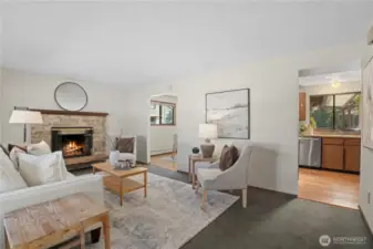 Enter Living Room with coxy wood burning firepace