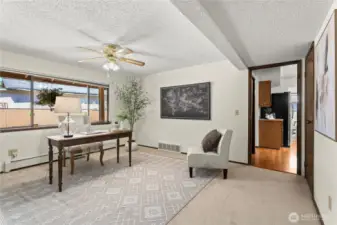 would easily accommodate 2 nice size desk areas
