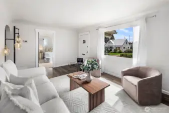 Large picture windows frame the neighborhood while flooding the room with natural light, making it the true heart of the home.