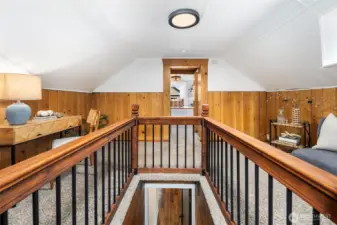 Warm wood details and fresh finishes lead you seamlessly between levels of the home.