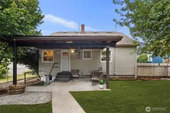 Step outside to this versatile covered patio and fenced yard, blending indoor comfort with outdoor living.