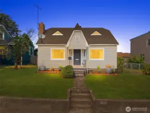Evening glow highlights this home’s curb appeal, offering a picture-perfect first impression every time you come home.
