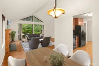 View from dining to living room. Virtually staged.