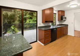 Kitchen with slider to deck.
