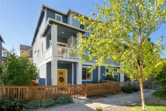 Welcome to one of the larger townhomes in High Point. This one lives like a zero lot line with only one adjoining property. A fenced yard is through the gate and runs up the left side.