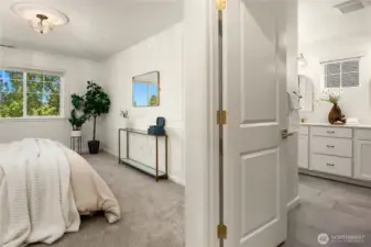 Just off the primary is a tiled ensuite and walk-in closet.